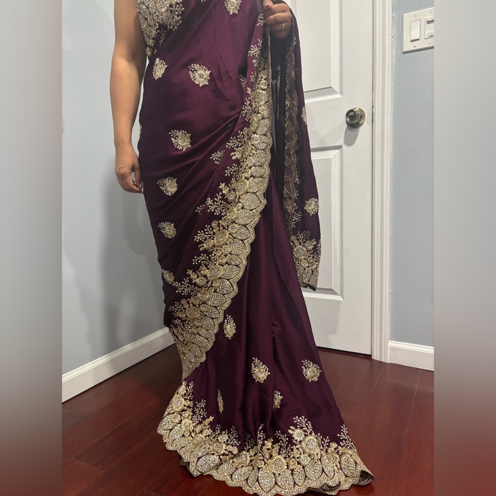 Elegant wine color and Gold Embroidered Saree